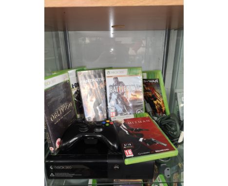 Xbox 360 console with power supply and games and controller. 