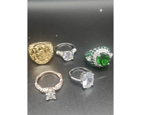 Lot of rings to include large silver green and clear stone stunning ring. 