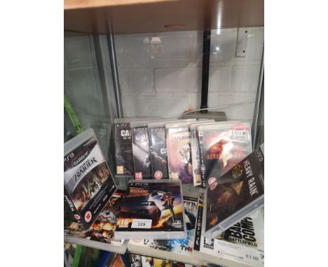 Shelf of PlayStation 3 games. 