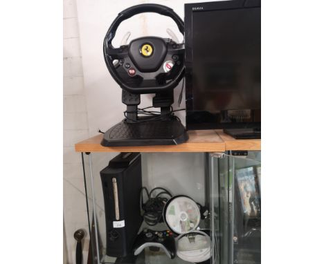 Xbox 360 console with power supply and games including ferrari steering wheel etc. 