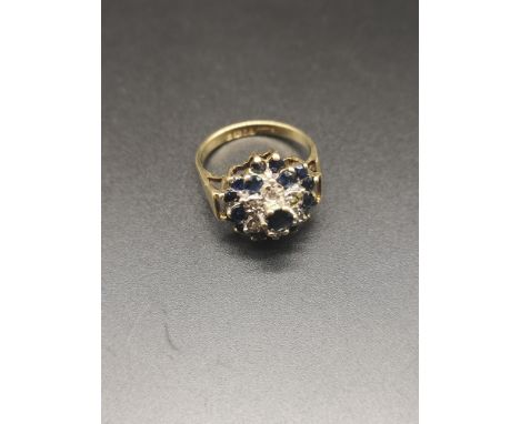 9ct gold diamond and sapphire set ring. 