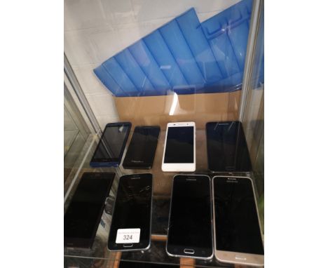 Shelf of Samsung, blackberry mobile phones etc. 