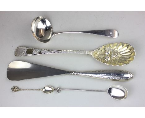 A George III Scottish silver berry serving spoon with shell engraved handle, hallmarked Edinburgh 1806 23cm, a George IV silv