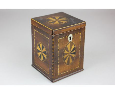 A George III rectangular tea caddy with mahogany, ebony and boxwood inlaid bats wing roundels and banded inlay decoration wit