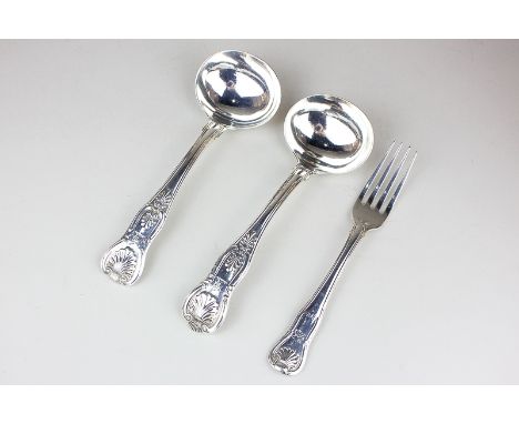 A George IV silver Kings pattern sauce ladle, London 1826, another similar Victorian ladle, London 1837, with engraved stag's