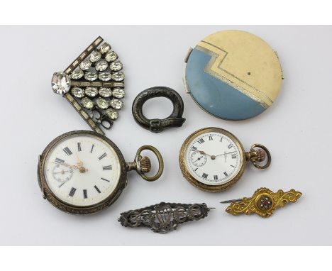 Four various brooches; a silver watch; a gold plated watch; a compact and a silver propelling pencil