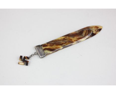 An early 20th century tortoiseshell bookmark with sterling silver mount and swastika fob, marked pat 21210, 10cm