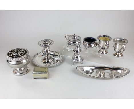 A silver plated cruet with blue glass liners, a chamber stick, three vases, a dish and a trinket box