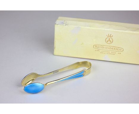 A pair of David Andersen silver gilt and turquoise enamel sugar tongs, marked D A Norway, sterling 10cm long, in original box