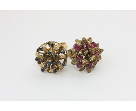 A ruby cluster dress ring in 14ct gold and a sapphire cluster ring in yellow gold