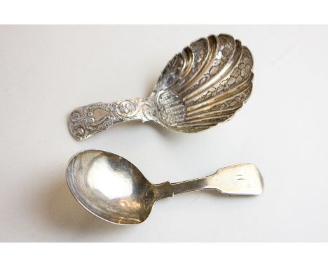 A George IV silver caddy spoon, maker William Elliot, London 1827, with ornate handle and shell bowl, together with another p