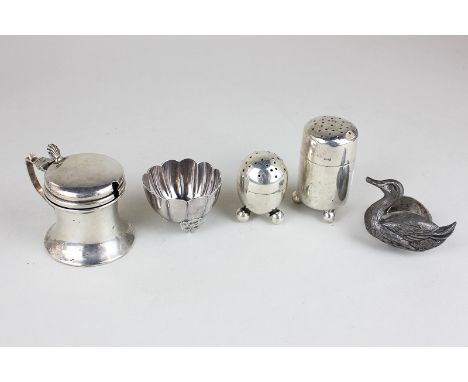 An Edward VII silver mustard with green glass liner, a silver pepper, a sterling silver salt, a white metal pepper and an Edw