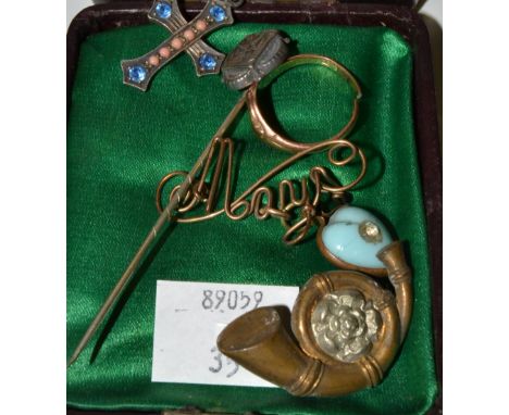 A 9ct rose gold ring;  a silver stick pin;  a brooch, Mary;  etc 