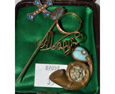 A 9ct rose gold ring;  a silver stick pin;  a brooch, Mary;  etc 