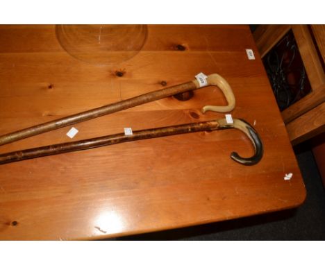 A shepherds crook walking stick with horn handle;  another (2)