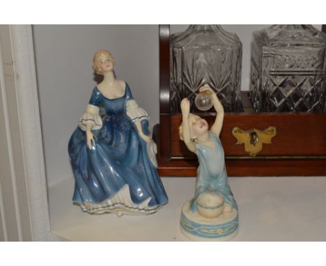 A Royal Doulton figure, Hilary, HN2335;  a Royal Worcester figure, Bubbles, modelled by Freda Doughty, puce mark