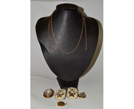 A 9ct gold locket, engraved and chased with scrolling foliage;  a 9ct gold mounted cameo brooch;  a ceramic and metal buckle 