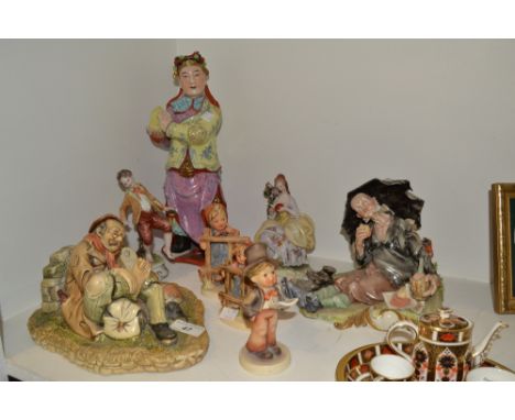 Ceramics - a Capo-di-Monte Tramp, printed mark;  a Chinese figure, standing, decorated with flowing robes, 20th century;  Goe