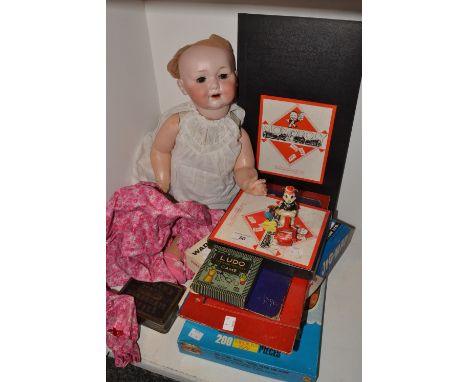 Toys - an Armand Marseille bisque head doll, marked  327, Germany; vintage board games 