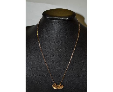 A 9ct gold chain, a pair of 9ct gold earring, 6.8g gross