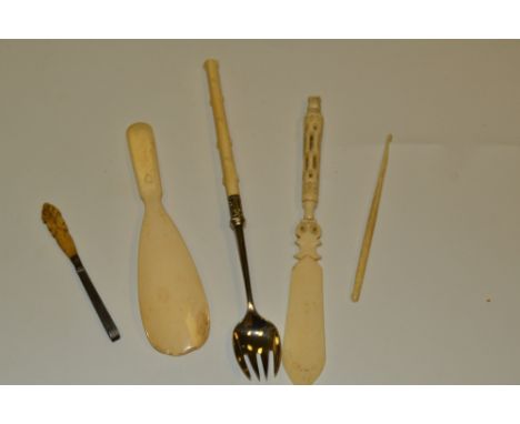 A Victorian silver plate fork, carved ivory handle as a branch;  a carved bone paper knife, button hook etc (5)