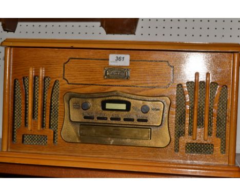 A Daklin Museum series music centre, record player and compact disc player 