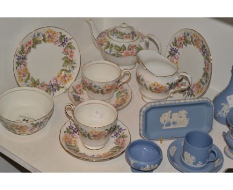 A Paragon Country Lane pattern tea for two, comprising teapot, milk jug, sugar bowl and two teacups, saucers and side plates,