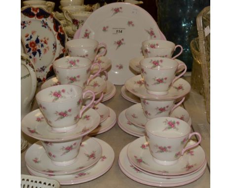 A Shelley tea service, for eleven, each printed with roses, pink line borders, printed marks, pattern 2513