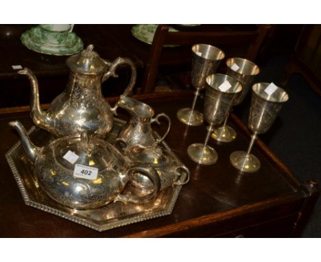 Plated Ware - an EP four piece  tea and coffee service; goblets; brassware
