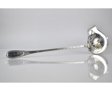 A German 800 Silver Ladle by Clemens Dahmen having Lipped Bowl with Pierced Cover, 37cm Long. 