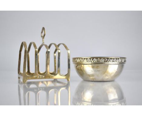 A George V Silver Sugar Bowl, Birmingham 1920 Hallmark, 9.5cms Diameter and 82gms Together with a George V Silver Toast Rack 