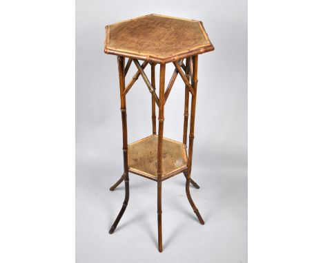 A Late 19th/20th Century Bamboo Rattan Octagonal Stand with Stretcher Shelf, 77cm High 