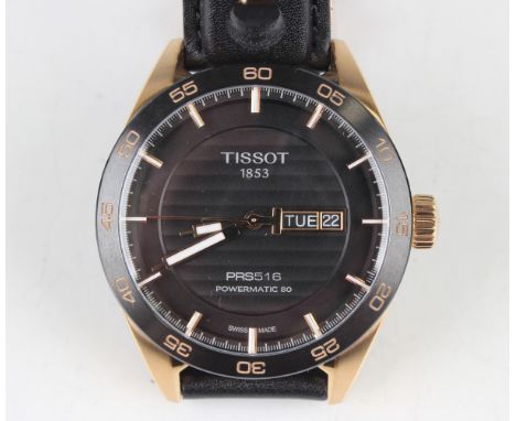 A Tissot PRS 516 Powermatic 80 gilt finished stainless steel cased gentleman's wristwatch, the signed black dial with day and