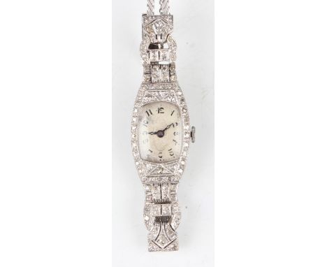 A Gelda platinum cased and diamond set lady's dress wristwatch with signed oval jewelled movement, the silvered dial with Ara