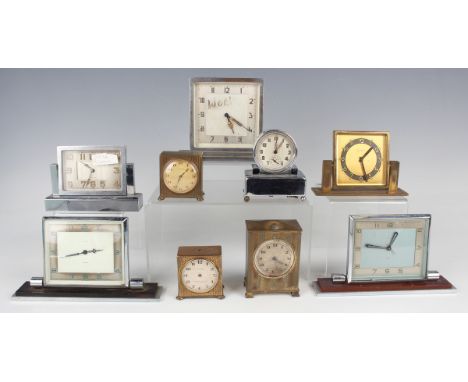 An Art Deco gilt brass desk timepiece, the square dial with gilt Arabic hour numerals and detailed 'Collingwood &amp; Co...',
