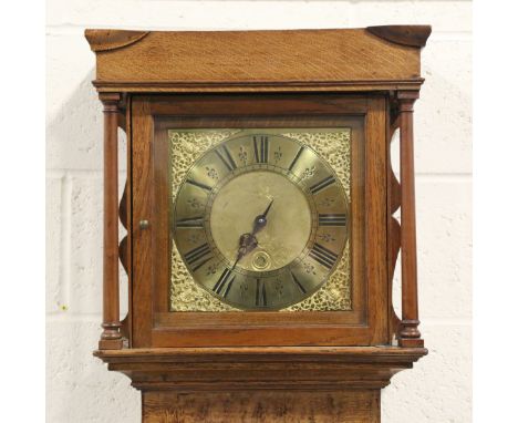 A George III oak longcase clock with thirty hour movement striking on a bell via an outside countwheel, the 11-inch square br