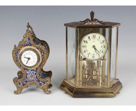 A late 19th century French brass and champlevé enamel mantel timepiece, the movement with platform escapement, the balloon sh