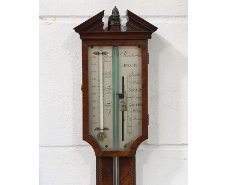 A George III mahogany stick barometer, the silvered dial with vernier scale and alcohol thermometer and inscribed 'Manticha',