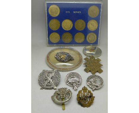 Military badges, a compact with Royal Engineers badge and a set of ten space travel commemoratives