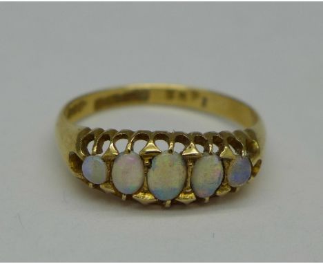 An 18ct gold and opal ring, Birmingham 1916, 2.9g, O