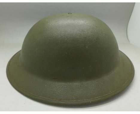 A WWII helmet, Brodie design, rim marked 11VB55SLO