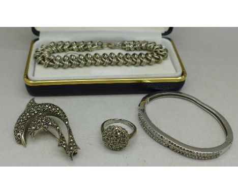 Silver jewellery including a bangle, a/f, a marcasite ring, a dolphin brooch and a white metal bracelet