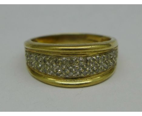 A 9ct gold and diamond ring, 4.7g, T