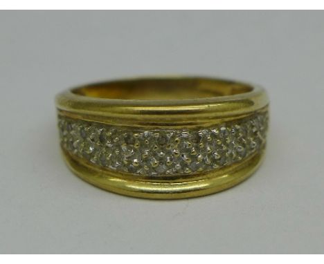 A 9ct gold and diamond ring, 4.7g, T