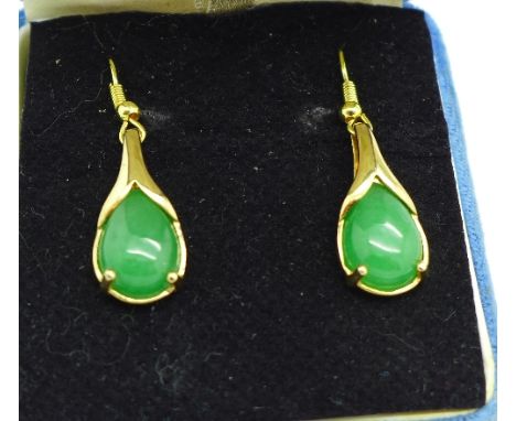A pair of silver gilt and jade earrings