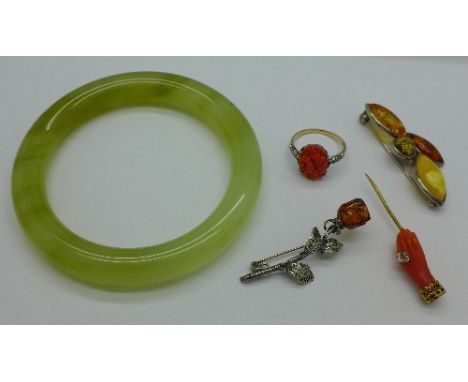 A bangle and other jewellery including a 9ct gold and silver, coral set ring