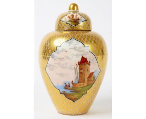 A GERMAN PORCELAIN GILT SCALE GROUND JAR AND COVER, PAINTED WITH COASTAL SCENES, 23CM H, UNDERGLAZE BLUE PAINTED CROWN AND DR