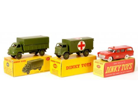 THREE DINKY TOYS, COMPRISING CANADIAN FIRE CHEIF'S CAR 257, THREE TONNE ARMY WAGON 621 AND MILITARY AMBULANCE 626, BOXED