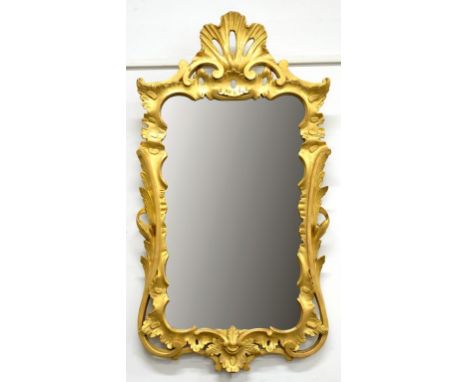 A ROCOCO STYLE GILTWOOD MIRROR, WITH PIERCED SHELL CREST, 89CM H, 19TH C AND TWO WALNUT FRETTED FRAME MIRRORS