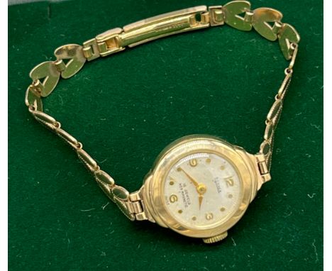 Vintage ladies 9ct yellow gold cocktail watch, 9ct gold cased and strap. Bernex- 15 Jewels- Non Magnetic. [In a working condi